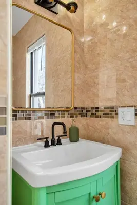 a bathroom with a sink and a mirror at Green N' Groovy in the Heart of East Rock Near DT, Yale in New Haven
