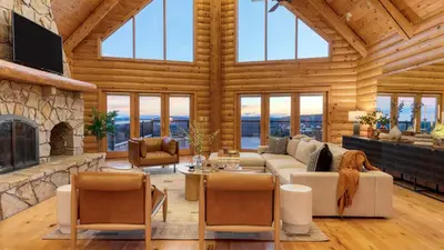 a living room with a couch and a fireplace at Chester by AvantStay Amazing Views Secluded Home A True City Escape in Austerlitz