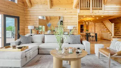 a living room with a couch and a table at Chester by AvantStay Amazing Views Secluded Home A True City Escape in Austerlitz