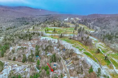 an aerial view of a resort in the mountains at Mowing Way Retreat in Wilmington