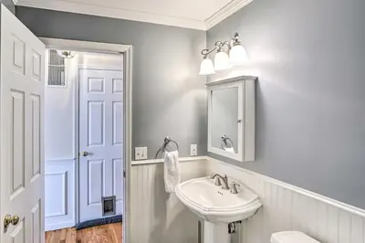 a bathroom with a sink and a mirror at Pet-Friendly Beacon Area Vacation Rental 6 Acres in Lagrangeville