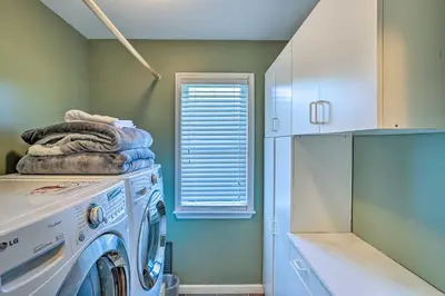 a washing machine in a laundry room with a window at Pet-Friendly Beacon Area Vacation Rental 6 Acres in Lagrangeville