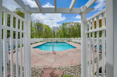 a white pergola over a swimming pool with a swimming poolvisor at Pet-Friendly Beacon Area Vacation Rental 6 Acres in Lagrangeville