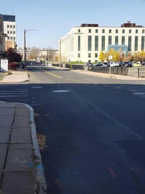 an empty street in a city with buildings at The Bushnell Suite C2 in Hartford