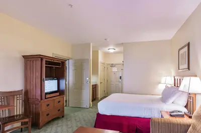 a hotel room with a bed and a television at Slopeside Ski-In/Ski-Out ; HotTub ; 2 Room 2 Bath in Hunter