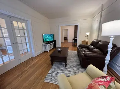 a living room with a couch and a table at Fantastic stay for 4 – Heart of Hoboken! in Hoboken
