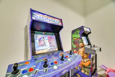 a video game machine and a game box at 3 Mi to Kalahari Pocono Summit Home with Pool Table in Pocono Summit