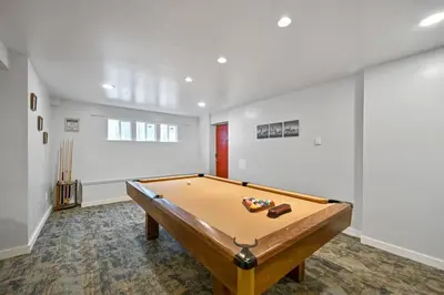 a billiard room with a pool table in it at Poconos Peaceful Retreat - Families & Large Groups in Tobyhanna