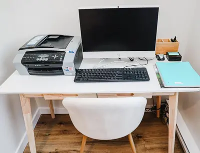 a desk with a computer and a printer on it at NEWLY REMODELED FOUR BEDROOM All SEASON CONDO W MOUNTAIN VIEWS in East Jewett