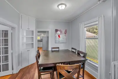 a dining room with a table and chairs at The Wheelhouse All Star Baseball Rentals in Oneonta