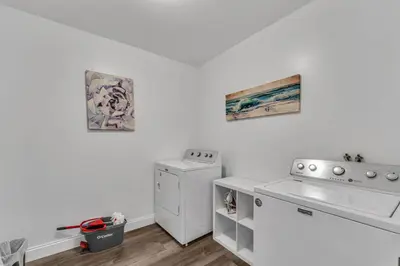 a white laundry room with a washer and dryer at Shortstop Apt 2 All Star Baseball Rentals in Oneonta