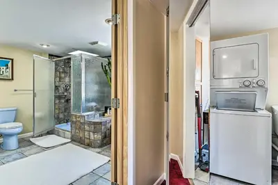 a bathroom with a shower and a sink and a toilet at All Year-Round Retreat Near Windham Mountain in Conesville
