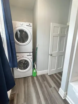 a washer and dryer in a laundry room at Triple Play Apt 2 All Star Baseball Rentals in Oneonta