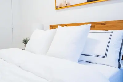 a white bed with white pillows on it at 1435-4 I 3 Bedrooms 2Bath W D Prime Upper east in New York
