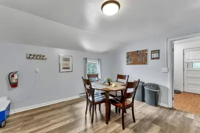 a dining room with a table and chairs at Babe Ruth Apt 2 All Star Baseball Rentals in Oneonta