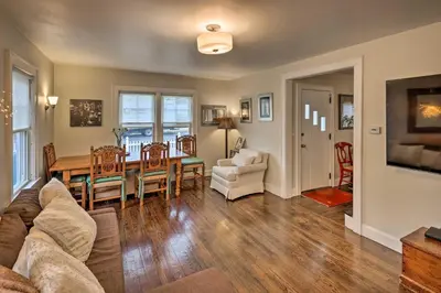 a living room with a couch and a table at Bridgeport Vacation Rental - Walk to Beach! in Bridgeport