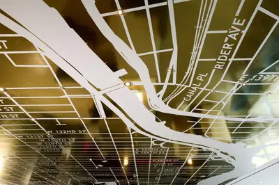 a ceiling of a building with white metal at Renaissance New York Harlem Hotel in New York