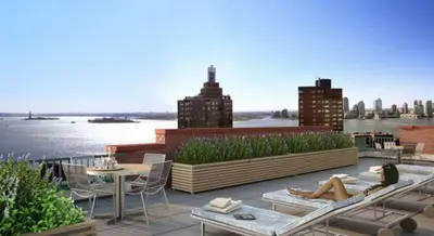 a rendering of a rooftop patio with a view of the city at Rector Place in New York