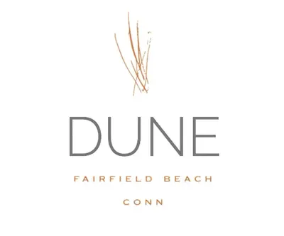 a rendering of a dune logo on a white background at DUNE Fairfield Beach in Fairfield