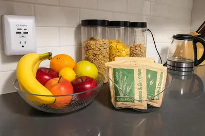 a counter with a bowl of fruit and a jar of cereal at Blue style Room in Guesthouse in New York