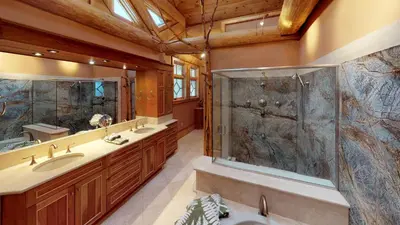 a bathroom with two sinks and a shower at Seneca Lodge in Cooperstown