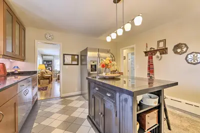 a kitchen with a large island in a room at Hadley Vacation Rental 24 Mi to Springfield! in Hadley