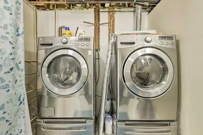 two washing machines are in a laundry room at Hadley Vacation Rental 24 Mi to Springfield! in Hadley