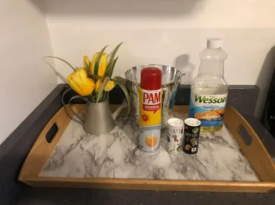 a tray with a blender and a vase of flowers on a counter at Private Rooms in TownHouse w Shared Baths Qn Bed 1-3ppl in Unionport