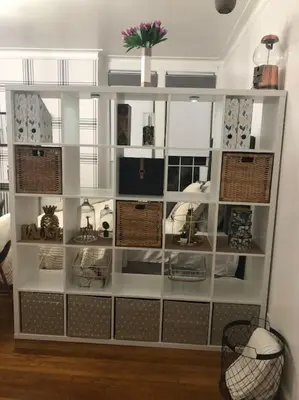 a large white shelf with wicker baskets on it at Private Rooms in TownHouse w Shared Baths Qn Bed 1-3ppl in Unionport