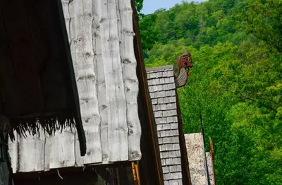 a view of the side of a building with trees at Vikings Villages Resort in Guilford