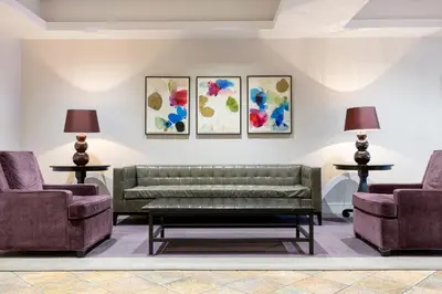 a living room with a couch and two chairs at Chelsea 1BR w Gym Concierge nr Penn Stn MSG NYC-439 in New York