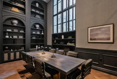 a dining room with a wooden table and chairs at FiDi 1br w lounge gym nr Freedom Tower NYC-1138 in New York