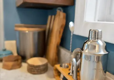 a kitchen counter with a tea kettle on a counter top at Sunset Cove in East Hampton