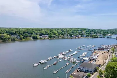 an aerial view of a marina with boats docked at Gorgeous Waterfront 3 Bedroom, 1.5 Bathroom Unit. in New Haven