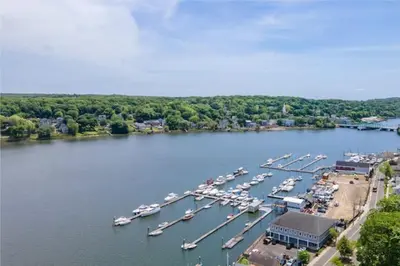 an aerial view of a marina with boats in the water at Gorgeous Waterfront 2:1 - 2 houses in 1 building. in New Haven