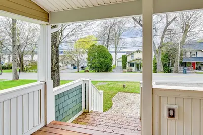 a porch with a view of a street at Saratoga Springs Vacation Rental with Lake Views! in Saratoga Springs