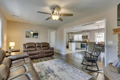 a living room with a couch and a ceiling fan at Walk to Lake Wallenpaupack Poconos Vacation Home in Lake Ariel